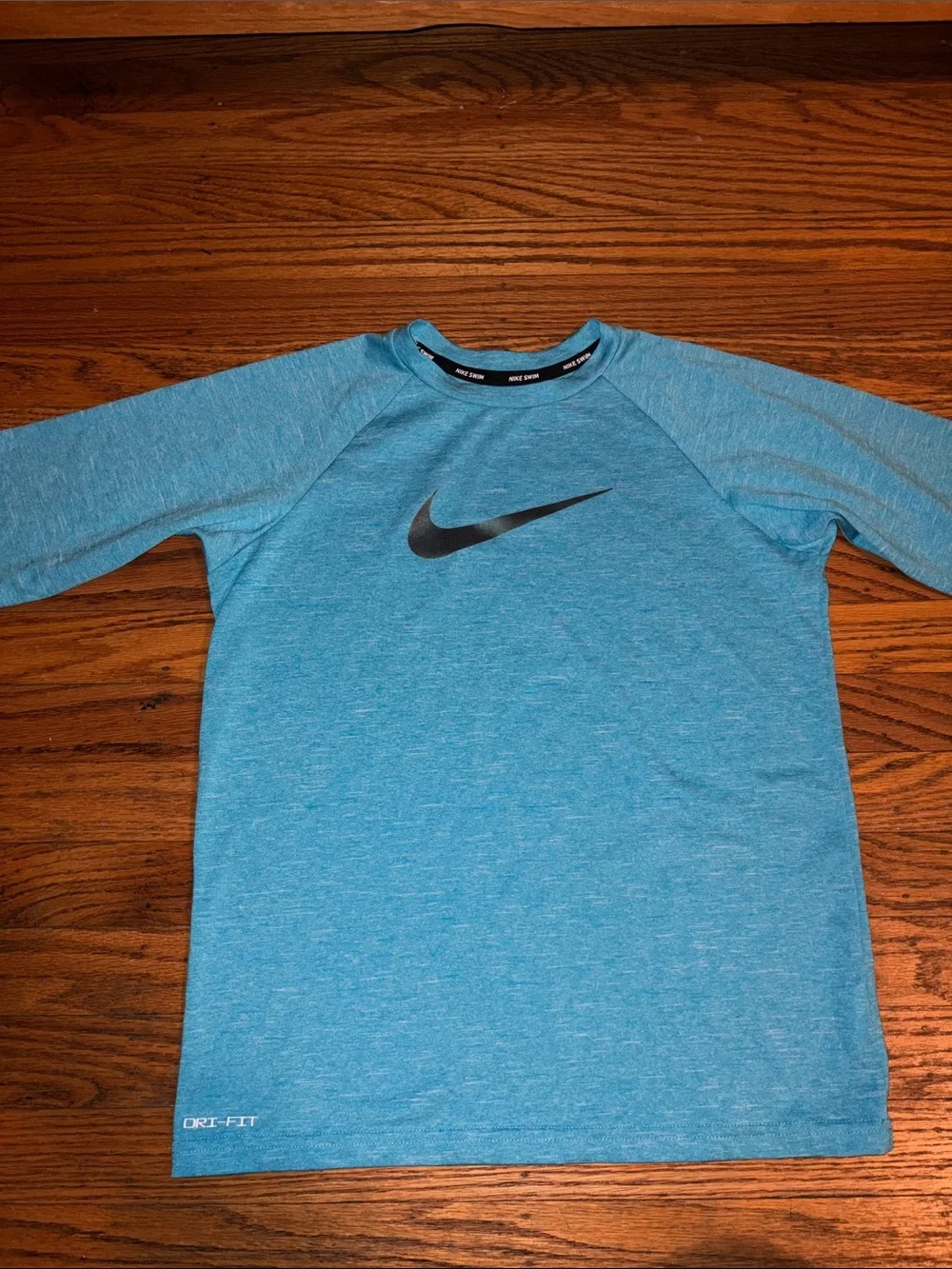 Nike Light Blue Dri-fit swim shirt size large